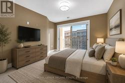 2nd Bedroom wt  Patio doors leading to balcony - 