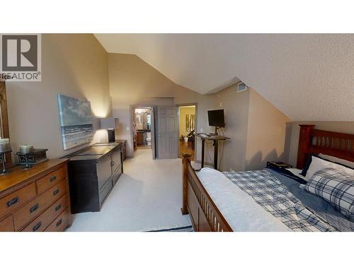205 Third Avenue Unit# 1403, Invermere, BC - Indoor Photo Showing Bedroom