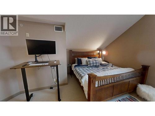 205 Third Avenue Unit# 1403, Invermere, BC - Indoor Photo Showing Bedroom