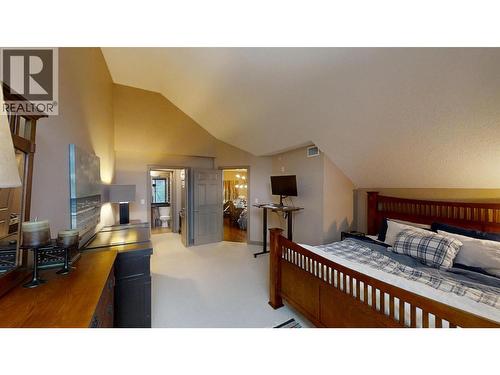 205 Third Avenue Unit# 1403, Invermere, BC - Indoor Photo Showing Bedroom