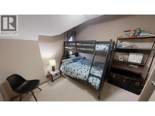 205 Third Avenue Unit# 1403, Invermere, BC - Indoor Photo Showing Bedroom