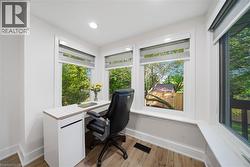 Ample three sided office windows provide scenic view - 