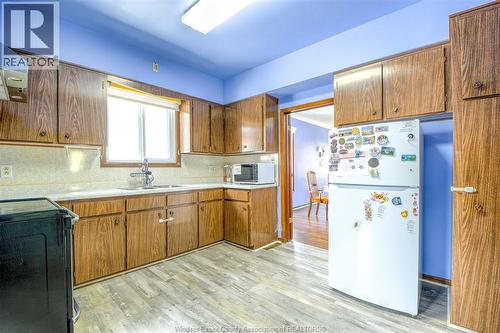 1233 Lincoln, Windsor, ON - Indoor Photo Showing Kitchen With Double Sink