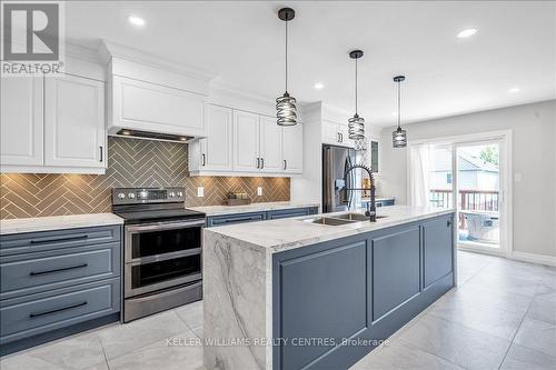 67 Hutton Place, Clarington, ON - Indoor Photo Showing Kitchen With Double Sink With Upgraded Kitchen