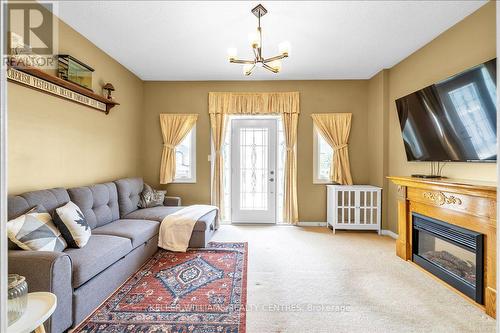 67 Hutton Place, Clarington, ON - Indoor Photo Showing Living Room With Fireplace