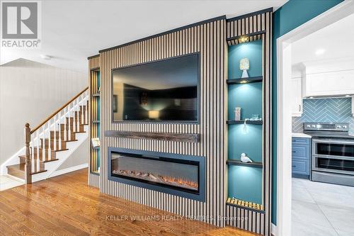 67 Hutton Place, Clarington, ON - Indoor Photo Showing Living Room With Fireplace