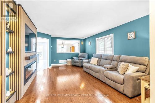67 Hutton Place, Clarington, ON - Indoor Photo Showing Living Room With Fireplace