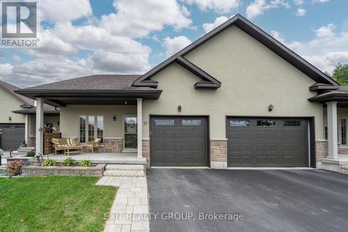 52 Aletha Drive, Prince Edward County (Wellington Ward), ON - Outdoor With Deck Patio Veranda With Facade