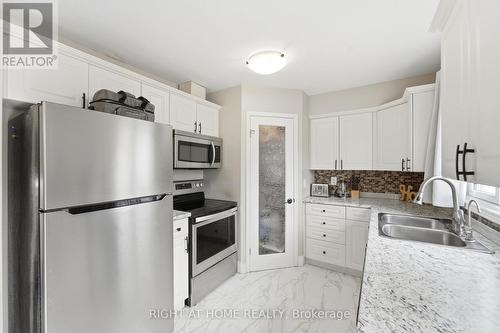65 Wellington South, Cambridge, ON - Indoor Photo Showing Kitchen With Double Sink