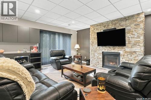 857 Reimer Road, Martensville, SK - Indoor Photo Showing Living Room With Fireplace