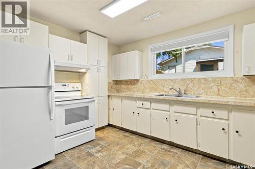 1009 East Centre, Saskatoon, SK - Indoor Photo Showing Kitchen With Double Sink