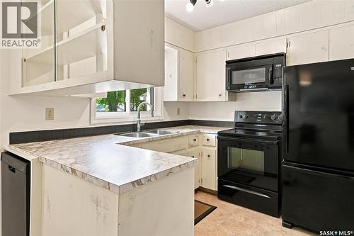1009 East Centre, Saskatoon, SK - Indoor Photo Showing Kitchen With Double Sink
