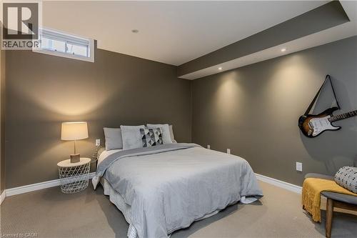Neutral-toned bedroom featuring recessed lighting, a window, and carpeting - 2121 Prospect Street, Burlington, ON - Indoor Photo Showing Bedroom