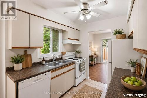 1 - 435 Kingscourt Drive, Waterloo, ON - Indoor Photo Showing Kitchen With Double Sink
