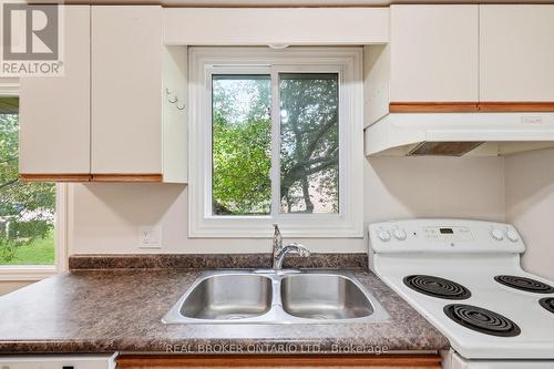 1 - 435 Kingscourt Drive, Waterloo, ON - Indoor Photo Showing Kitchen With Double Sink