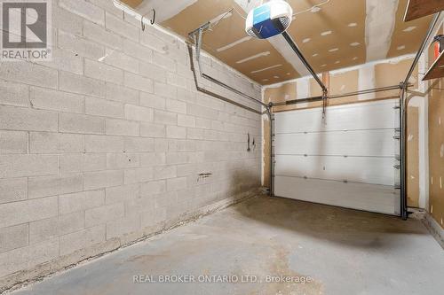 1 - 435 Kingscourt Drive, Waterloo, ON - Indoor Photo Showing Garage