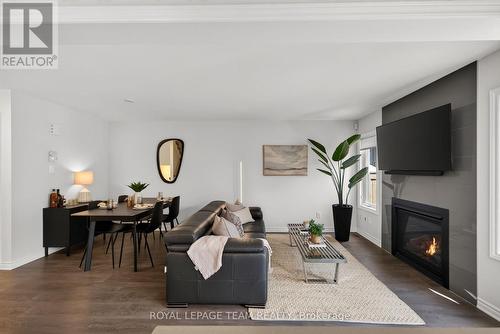 90 Buffalograss Crescent, Ottawa, ON - Indoor Photo Showing Living Room With Fireplace