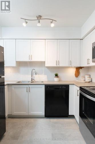 D6 - 240 Ormond Drive, Oshawa, ON - Indoor Photo Showing Kitchen With Double Sink