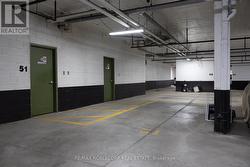 Spacious parking spot directly beside locker - 