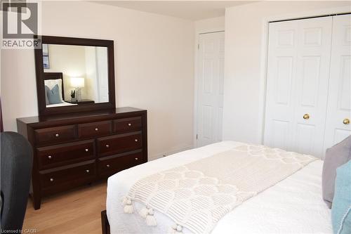 Bedroom featuring light wood-finish flooring and white walls - 28 Lemon Grass Street, Kitchener, ON - Indoor Photo Showing Bedroom