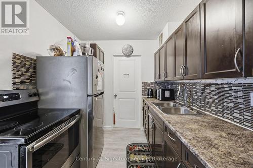 610 - 1250 Bridletowne Circle, Toronto, ON - Indoor Photo Showing Kitchen With Double Sink