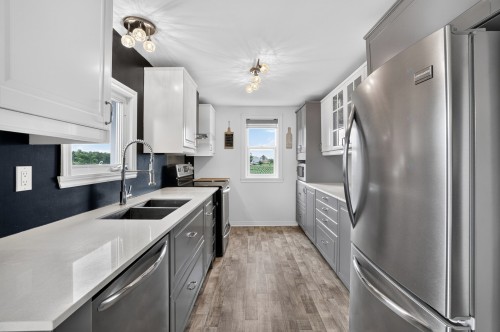 Cuisine - 801 9E Avenue, Saint-Lin/Laurentides, QC - Indoor Photo Showing Kitchen With Double Sink