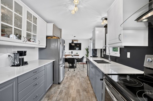 Cuisine - 801 9E Avenue, Saint-Lin/Laurentides, QC - Indoor Photo Showing Kitchen With Double Sink