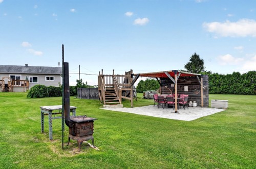 Cour - 801 9E Avenue, Saint-Lin/Laurentides, QC - Outdoor With Backyard
