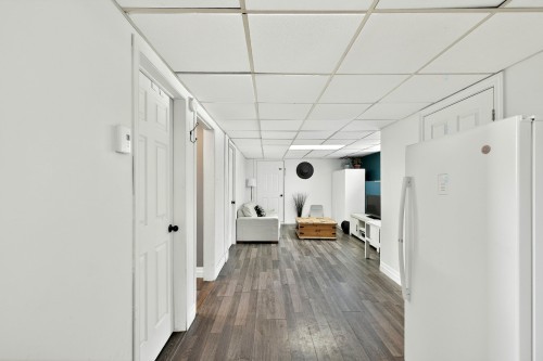 Salle familiale - 140 Rue Beaulieu, Sainte-Mélanie, QC - Indoor Photo Showing Other Room