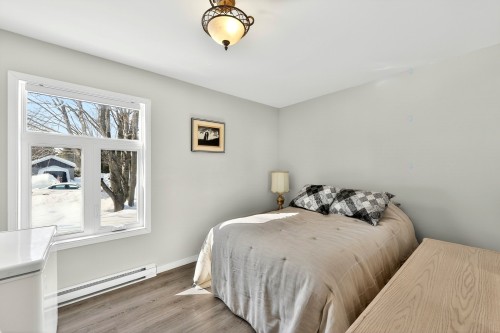 Intergénération - 140 Rue Beaulieu, Sainte-Mélanie, QC - Indoor Photo Showing Bedroom