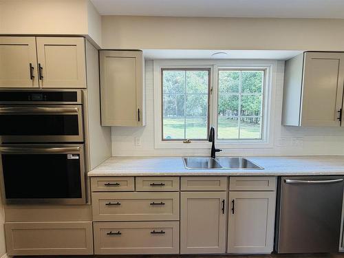 253 Riverview Drive, Dryden, ON - Indoor Photo Showing Kitchen With Double Sink