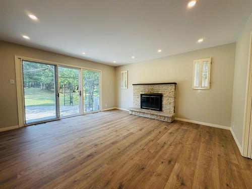 253 Riverview Drive, Dryden, ON - Indoor Photo Showing Living Room With Fireplace