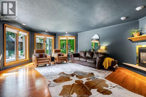 453 Gregory, Wheatley, ON - Indoor Photo Showing Living Room With Fireplace