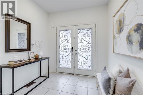 Double entry doors with ornate privacy glass - 598 Bessborough Drive, Milton, ON - Indoor Photo Showing Other Room