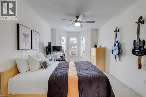 Recessed bay windows with plantation shutters - 598 Bessborough Drive, Milton, ON - Indoor Photo Showing Bedroom