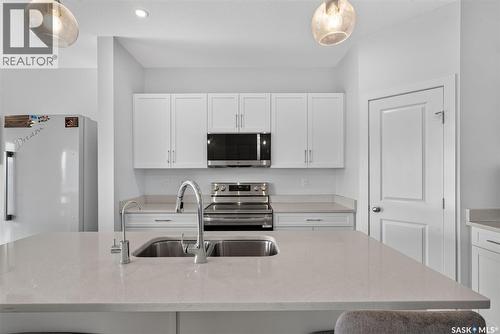 8 Aspen Place, Humboldt, SK - Indoor Photo Showing Kitchen With Double Sink With Upgraded Kitchen