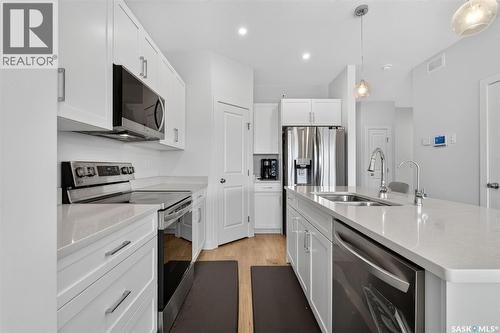 8 Aspen Place, Humboldt, SK - Indoor Photo Showing Kitchen With Stainless Steel Kitchen With Double Sink With Upgraded Kitchen