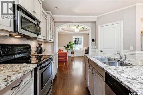 719 14Th Street E, Saskatoon, SK - Indoor Photo Showing Kitchen With Stainless Steel Kitchen With Double Sink