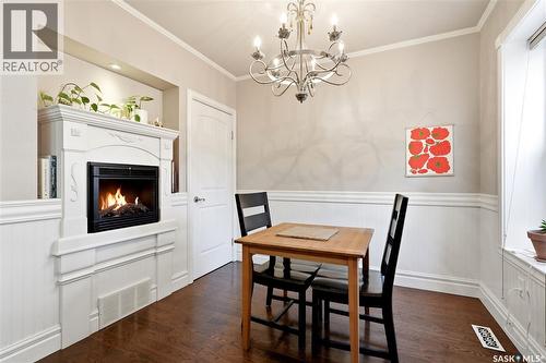 719 14Th Street E, Saskatoon, SK - Indoor Photo Showing Dining Room With Fireplace
