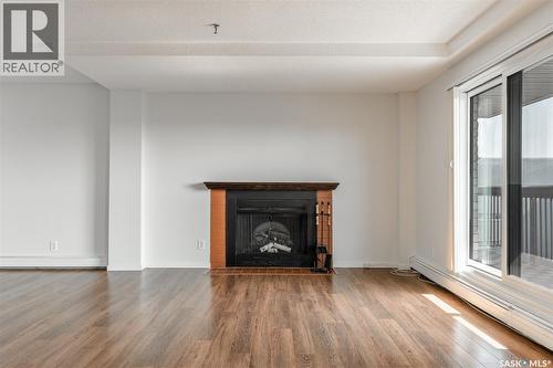 902 510 5Th Avenue, Saskatoon, SK - Indoor Photo Showing Living Room With Fireplace