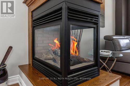 12 Lloyd Cook Drive E, Springwater, ON - Indoor Photo Showing Other Room With Fireplace