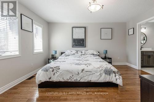 12 Lloyd Cook Drive E, Springwater, ON - Indoor Photo Showing Bedroom