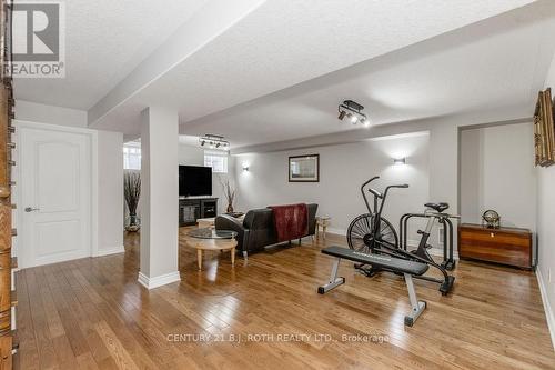 12 Lloyd Cook Drive E, Springwater, ON - Indoor Photo Showing Gym Room