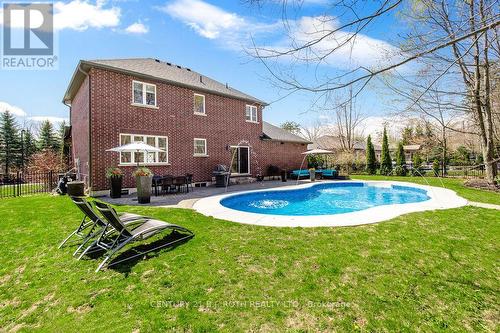 12 Lloyd Cook Drive E, Springwater, ON - Outdoor With In Ground Pool With Backyard