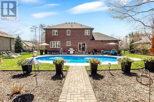 12 Lloyd Cook Drive E, Springwater, ON - Outdoor With In Ground Pool With Backyard