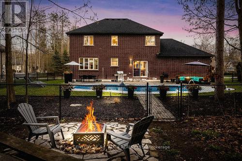 12 Lloyd Cook Drive E, Springwater, ON - Outdoor With In Ground Pool