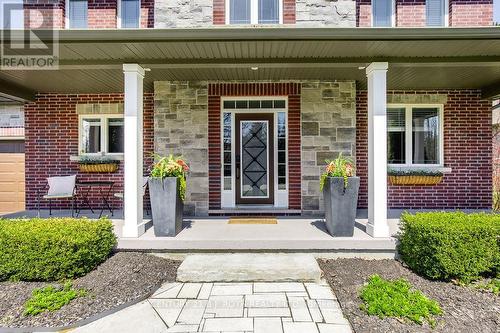 12 Lloyd Cook Drive E, Springwater, ON - Outdoor With Facade