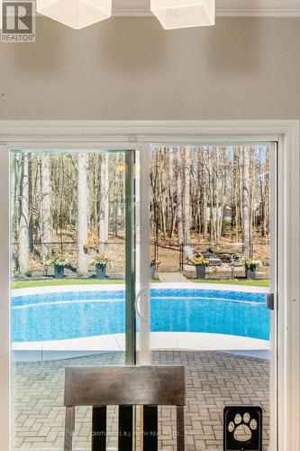 12 Lloyd Cook Drive E, Springwater, ON - Indoor Photo Showing Other Room With In Ground Pool