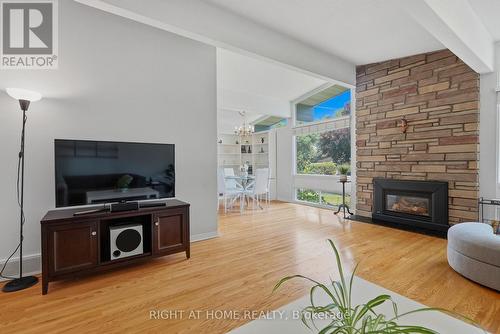 1272 Collins Avenue, Ottawa, ON - Indoor Photo Showing Living Room With Fireplace