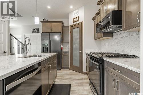 170 Palliser Court, Saskatoon, SK - Indoor Photo Showing Kitchen With Stainless Steel Kitchen With Double Sink With Upgraded Kitchen